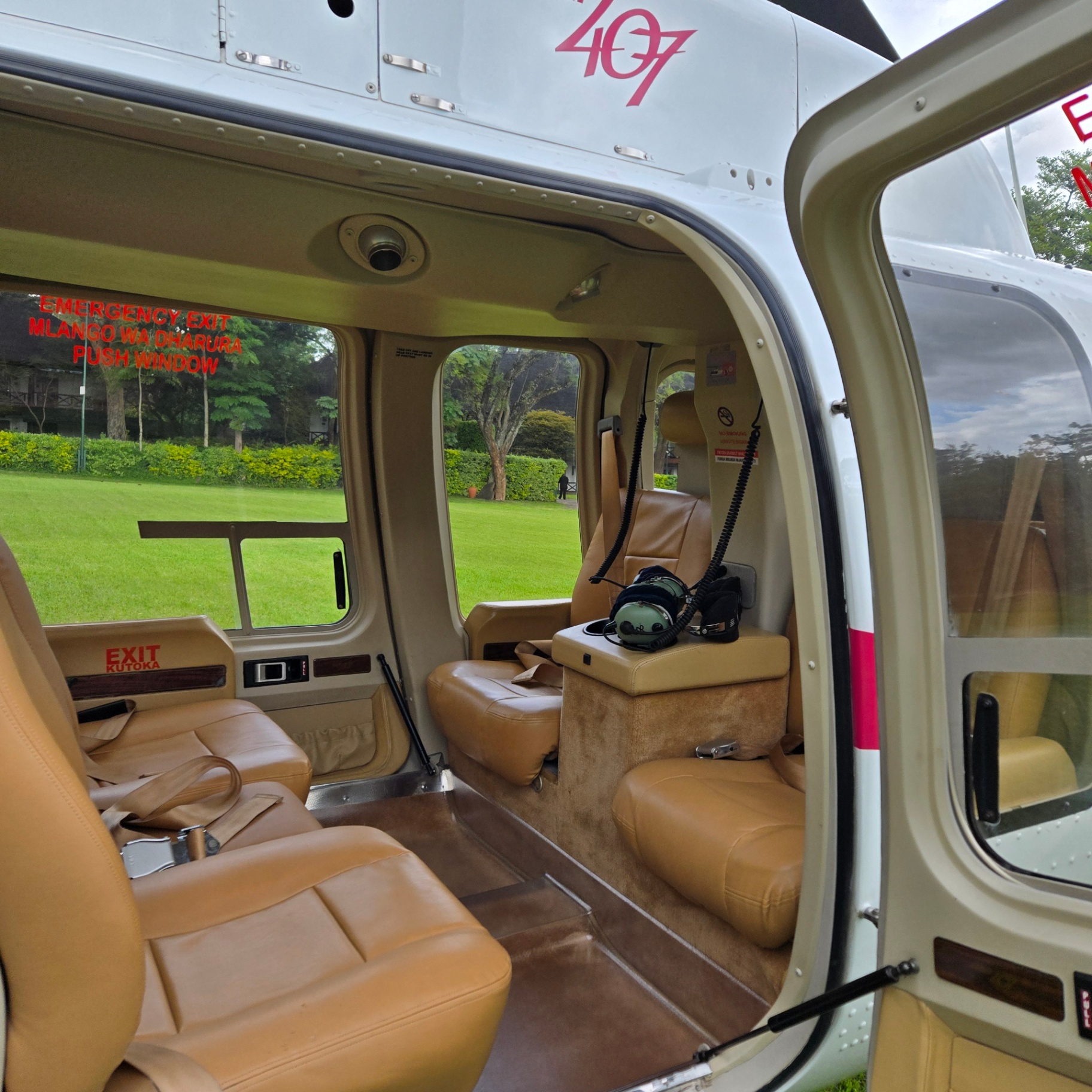 Bell 407 executive cabin with tan leather club seating